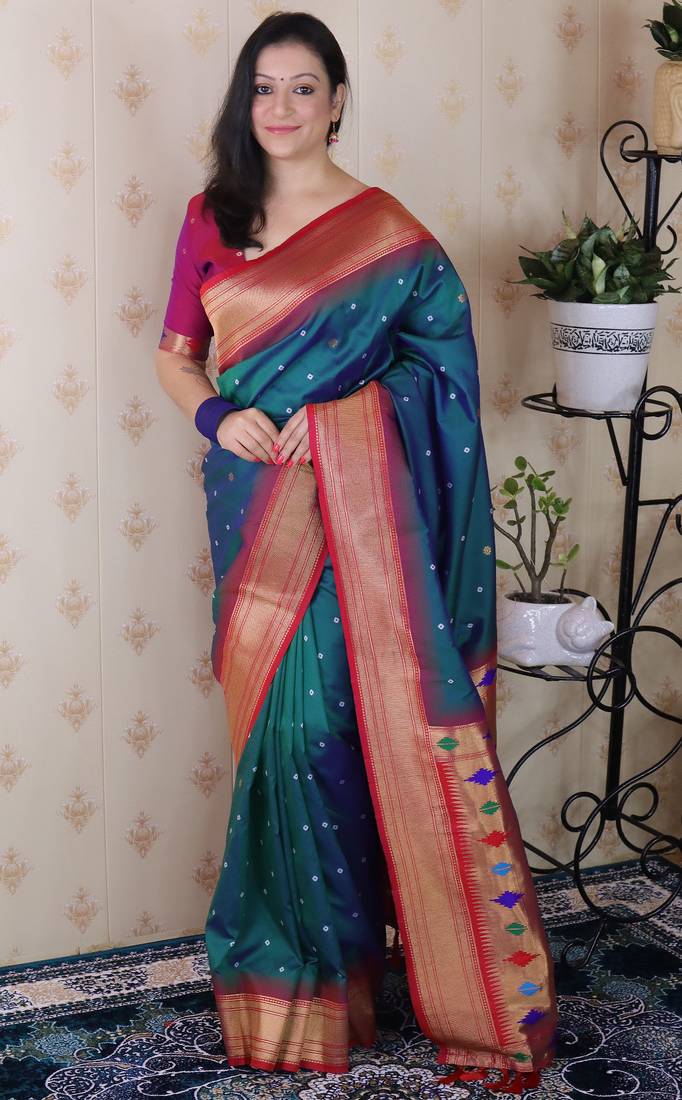 Teal paithani silk bandhani zari weaving saree with contrast blouse piece