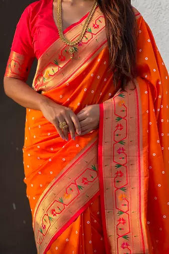 orange bandhani soft silk saree with zari weaving border