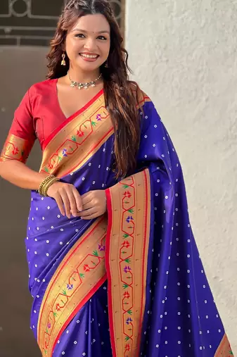 soft silk blue bandhani saree with zari weaving border