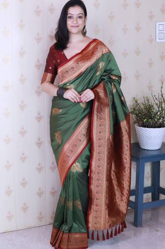 Green soft silk zari weaving saree with contrast blouse piece