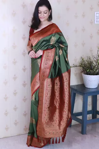 green soft silk saree with rich zari border & contrast blouse