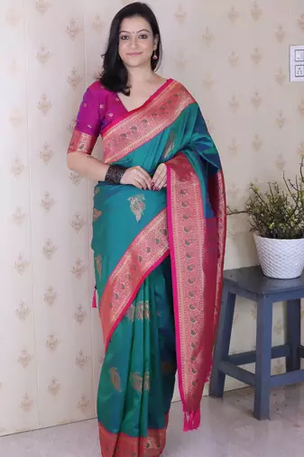 teal soft silk saree with rich zari border & contrast blouse