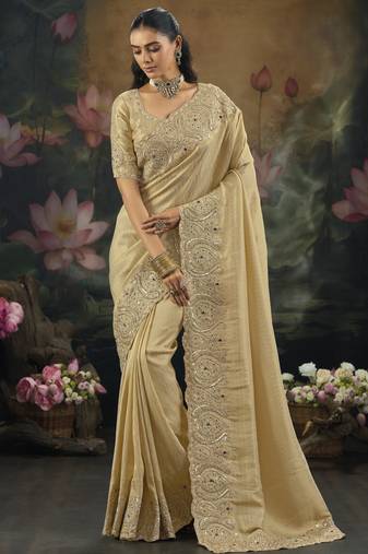 Chiku pure kanjivaram silk saree with moti cut-dana & emerald heavy work