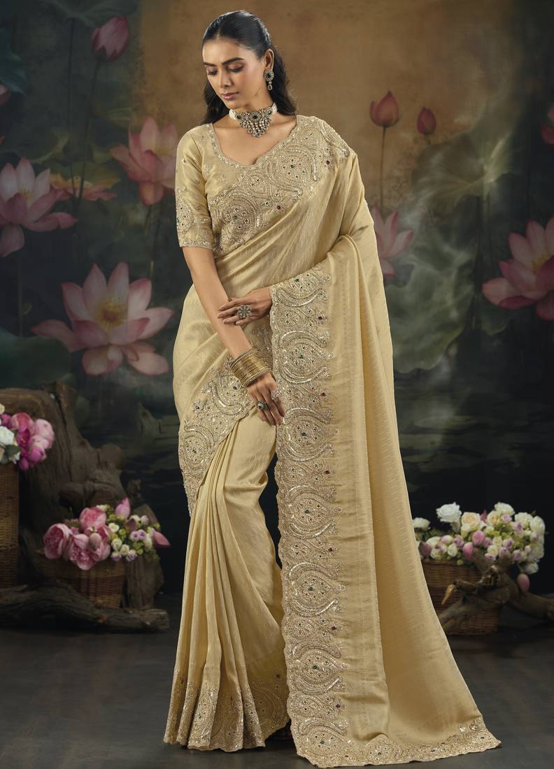 Chiku pure kanjivaram silk saree with moti cut-dana & emerald heavy work