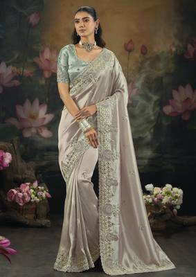  purple ziraf silk blend saree with cut dana & moti work
 1