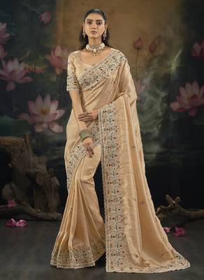 peach kanjivaram silk blend saree with moti cut dana & emerald work
 1