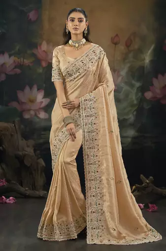 Peach pure kanjivaram silk saree with moti cut-dana & emerald work