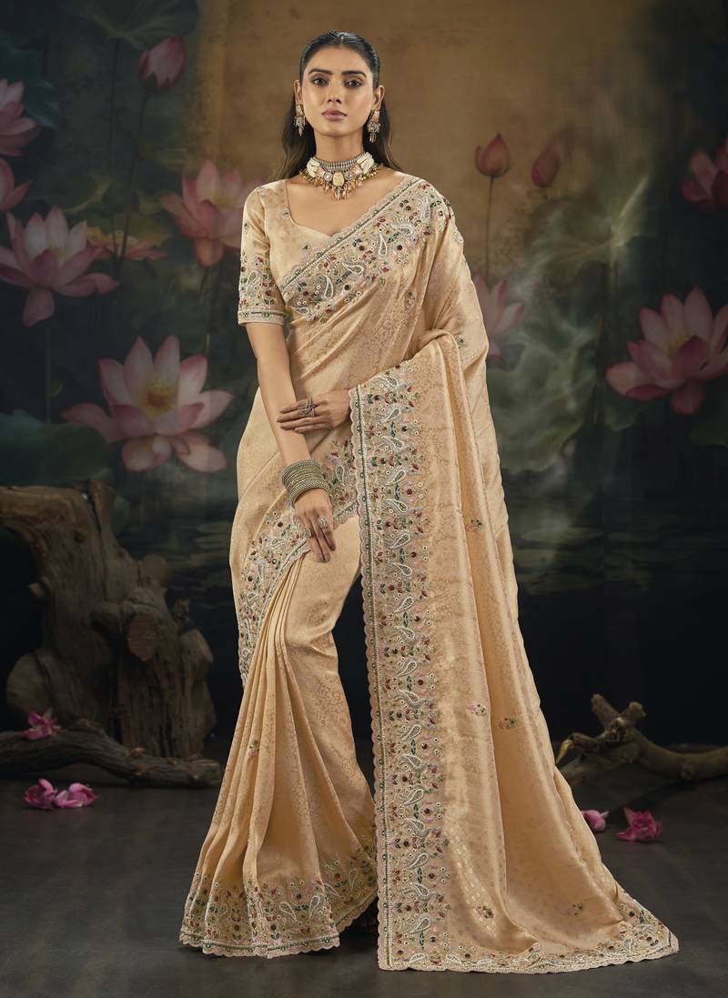 Peach pure kanjivaram silk saree with moti cut-dana & emerald work