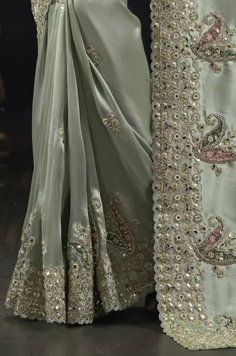 pista ziraf silk blend saree with cut dana & moti work