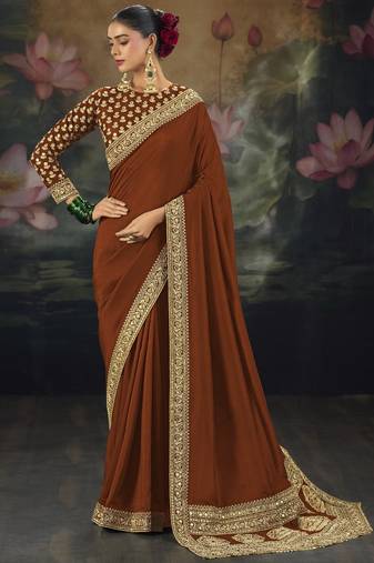 Dark orange pure muga silk saree with zari & metal sequin heavy work