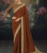 dark orange pure muga silk blend saree with zari and metal sequin work