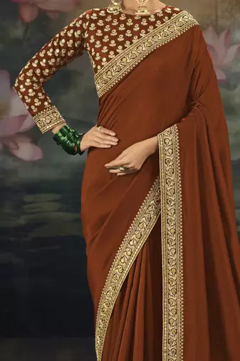dark orange pure muga silk blend saree with zari and metal sequin work