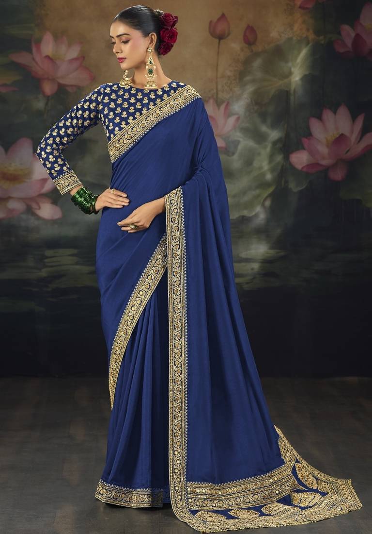 Blue pure muga silk saree with zari & metal sequin heavy work