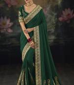 green muga silk heavy work saree with zari and metal sequin work