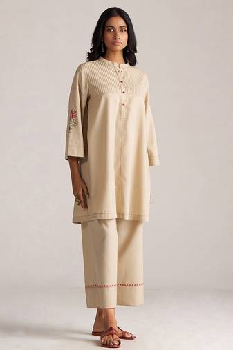 brown linen top and bottom set with minimal style