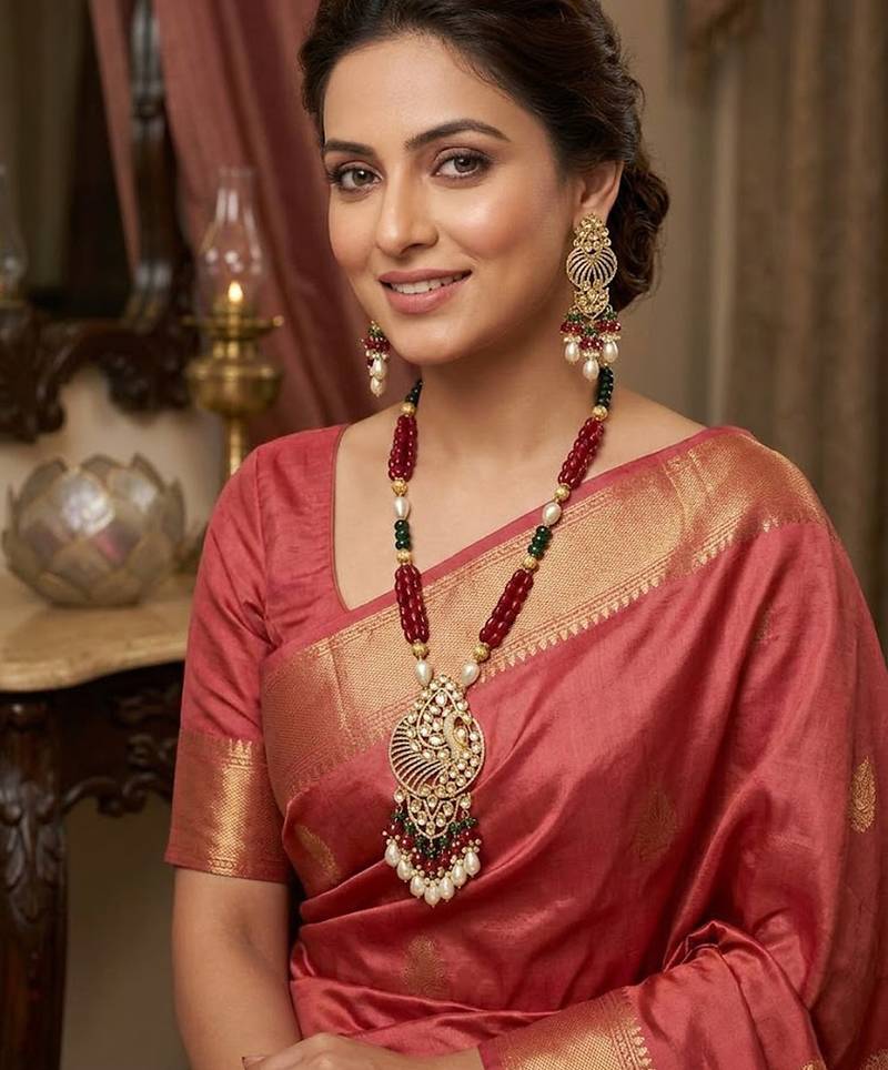 Traditional gold-plated peacock design long necklace set with red & green beads and pearl drops