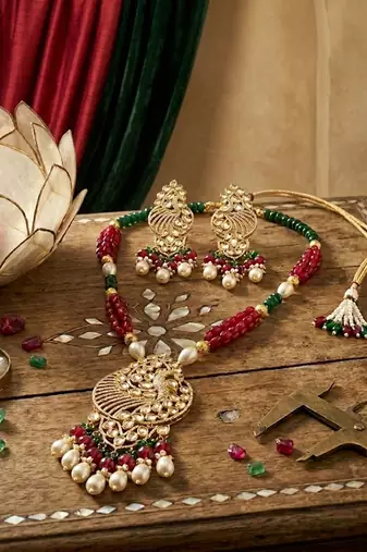 gold brass necklace set with peacock pendant pearl drop detailing