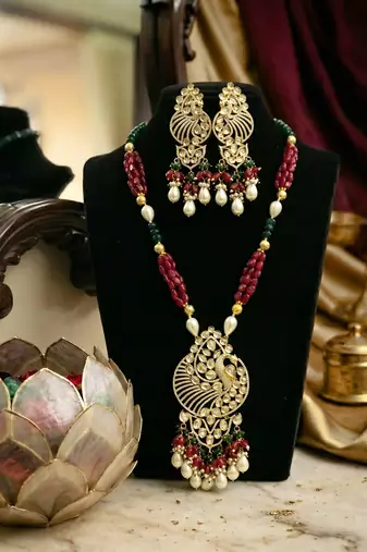 gold brass necklace set with peacock pendant pearl drop detailing
