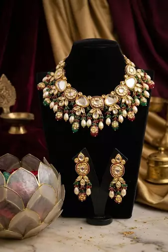 gold brass necklace set with kundan pearl drop bead design