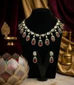 gold brass necklace set with kundan red stone motif work
