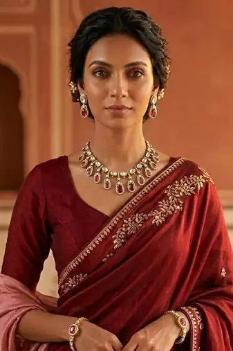 gold brass necklace set with kundan red stone motif work