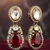 Traditional gold-plated kundan necklace set with red stone drops & matching earrings