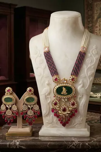 gold brass necklace set with ganesha kundan pearl work