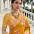 Mustard yellow russian silk saree with floral position print – festive & wedding wear