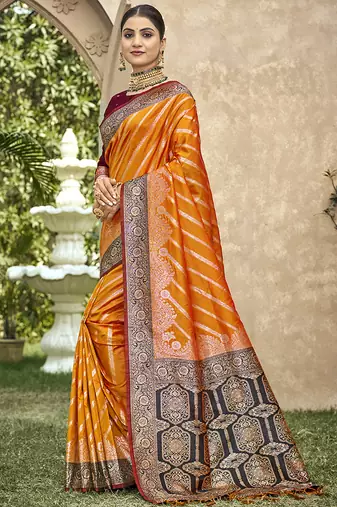 Elegant orange banarasi silk saree with maroon contrast blouse