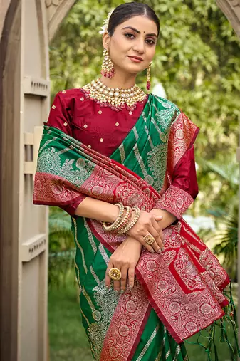 Bottle green & red banarasi silk saree with heavy woven zari work