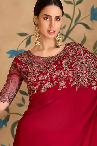 red faux georgette saree with embroidered border work