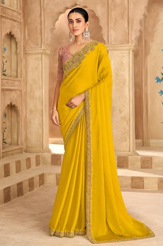 Embroidered faux chiffon satin yellow saree