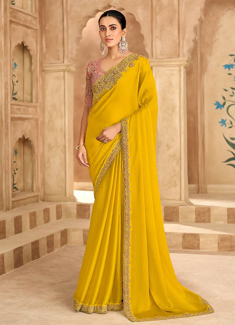 Embroidered faux chiffon satin yellow saree