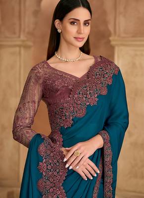 teal blue embroidered faux chiffon satin saree	 2