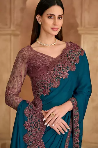 teal blue embroidered faux chiffon satin saree	
