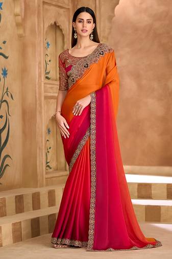 Embroidered faux chiffon satin orange & rani pink saree