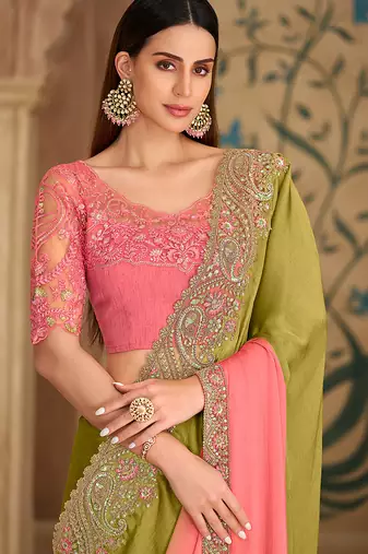 dual tone parrot green & pink embroidered faux georgette saree