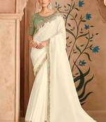 Embroidered faux chiffon satin off white saree