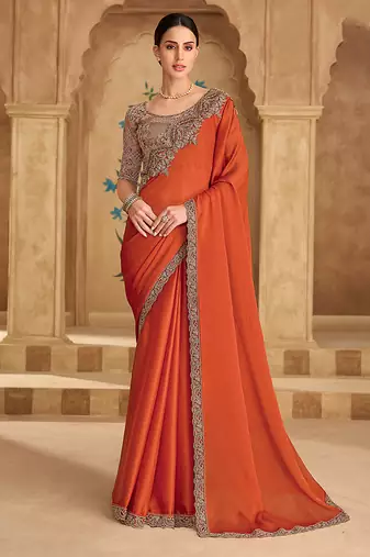 Embroidered faux chiffon satin orange saree