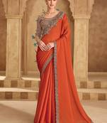 Embroidered faux chiffon satin orange saree