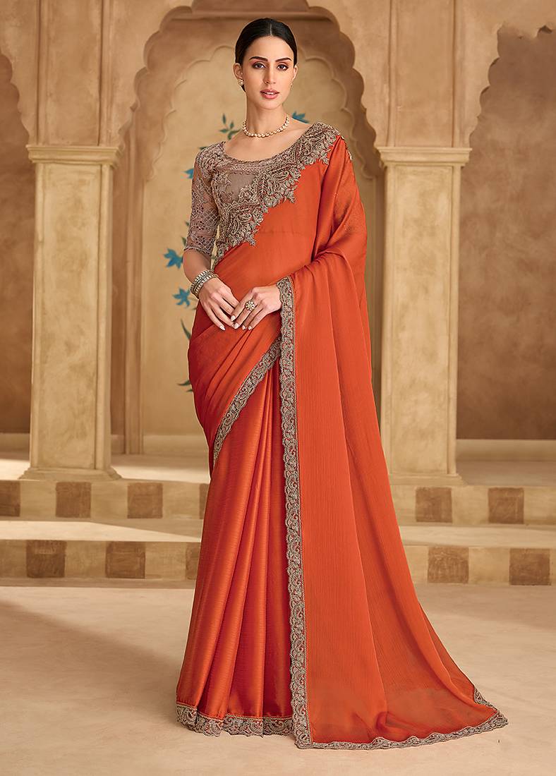 Embroidered faux chiffon satin orange saree