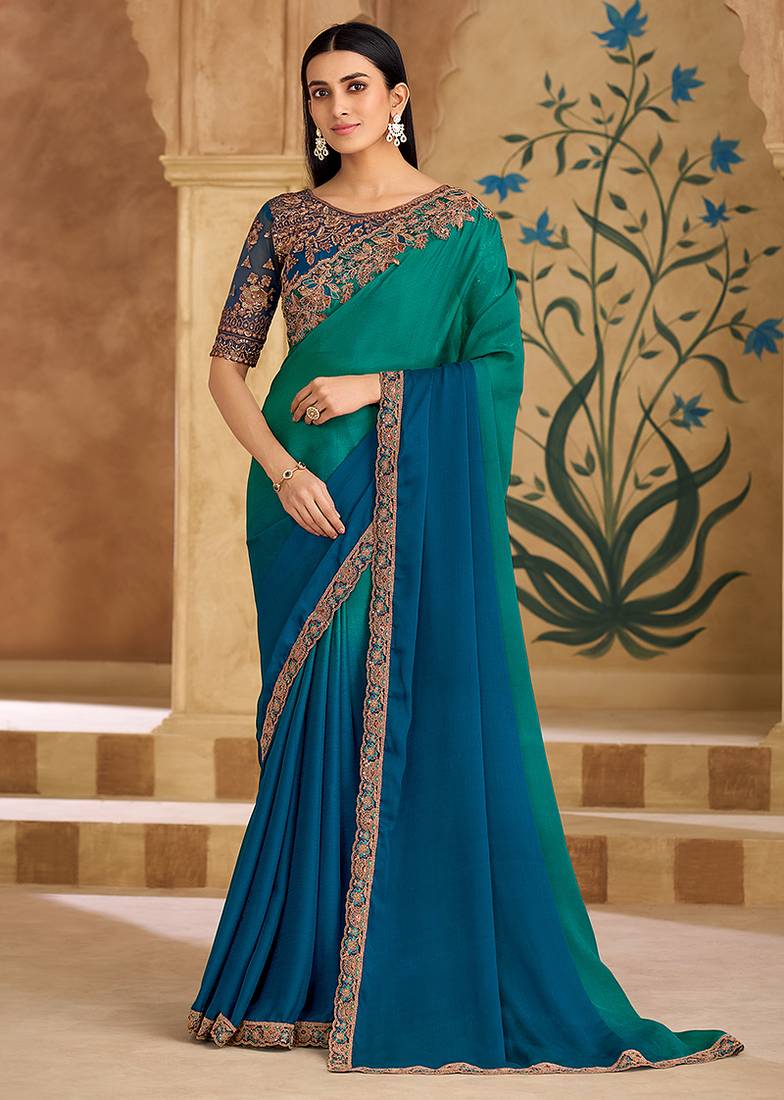 Embroidered faux chiffon teal green & blue saree