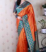 orange banarasi silk saree with zari weaving border