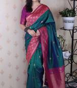 teal banarasi silk saree with zari weaving border