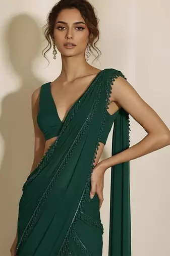 Green embroidered georgette draped saree set