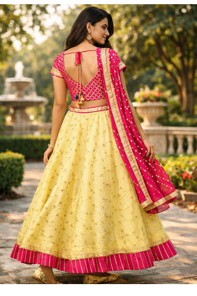 yellow kota silk hand embroidered lehenga with pink bandhani dupatta 2