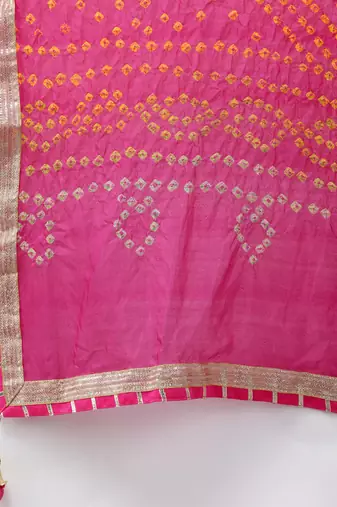 yellow kota silk hand embroidered lehenga with pink bandhani dupatta