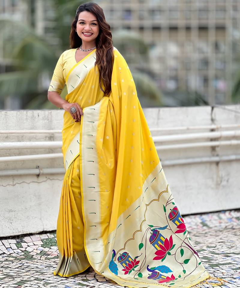 Yellow paithani silk zari weaving saree with matching blouse piece