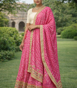 Pink Hand Bandhani Silk Lehenga With Unstitched Blouse And Dupatta