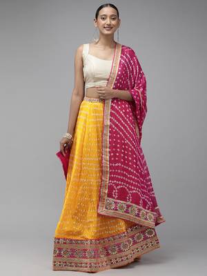 yellow silk patchwork lehenga set with pink bandhani dupatta 1